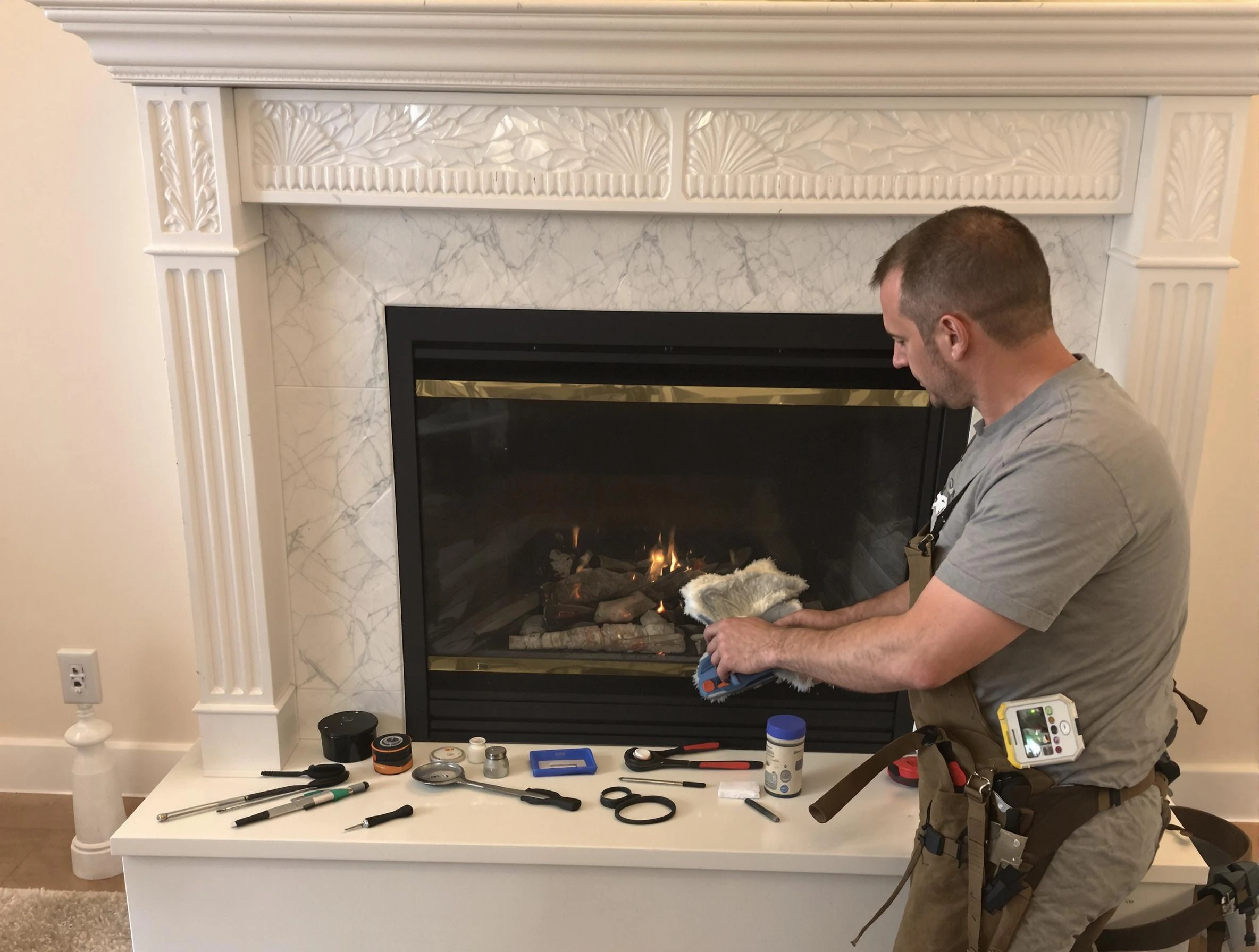 Brockton Chimney Sweep performing fireplace maintenance in Brockton, MA